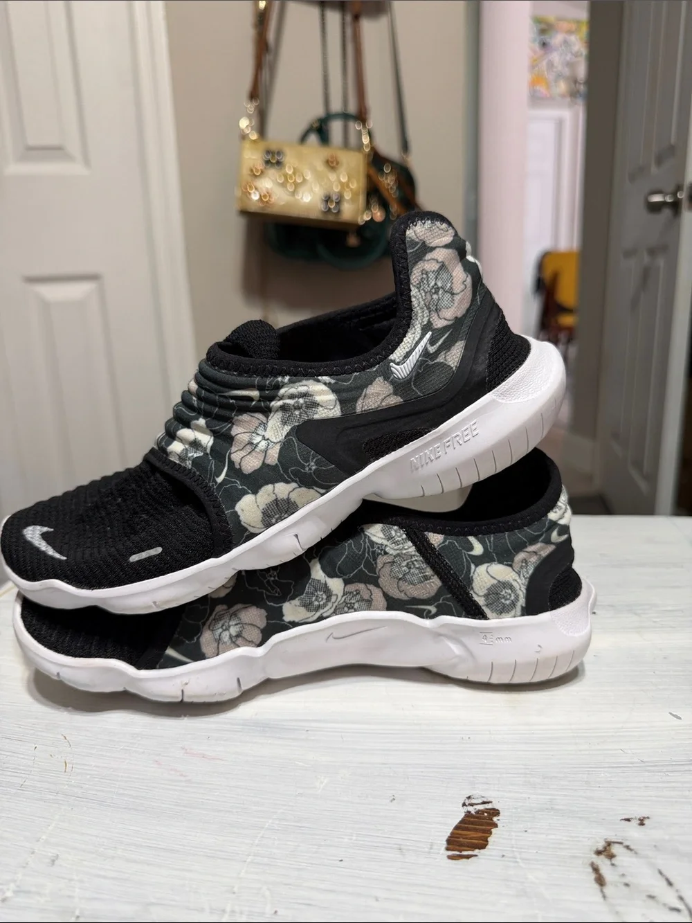 Nike Free RN Flyknit 3.0 sneakers in a black floral colorway size 8